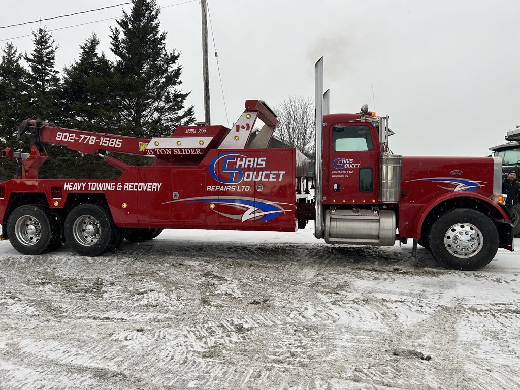 Chris Doucet Repairs Ltd tow truck — other side