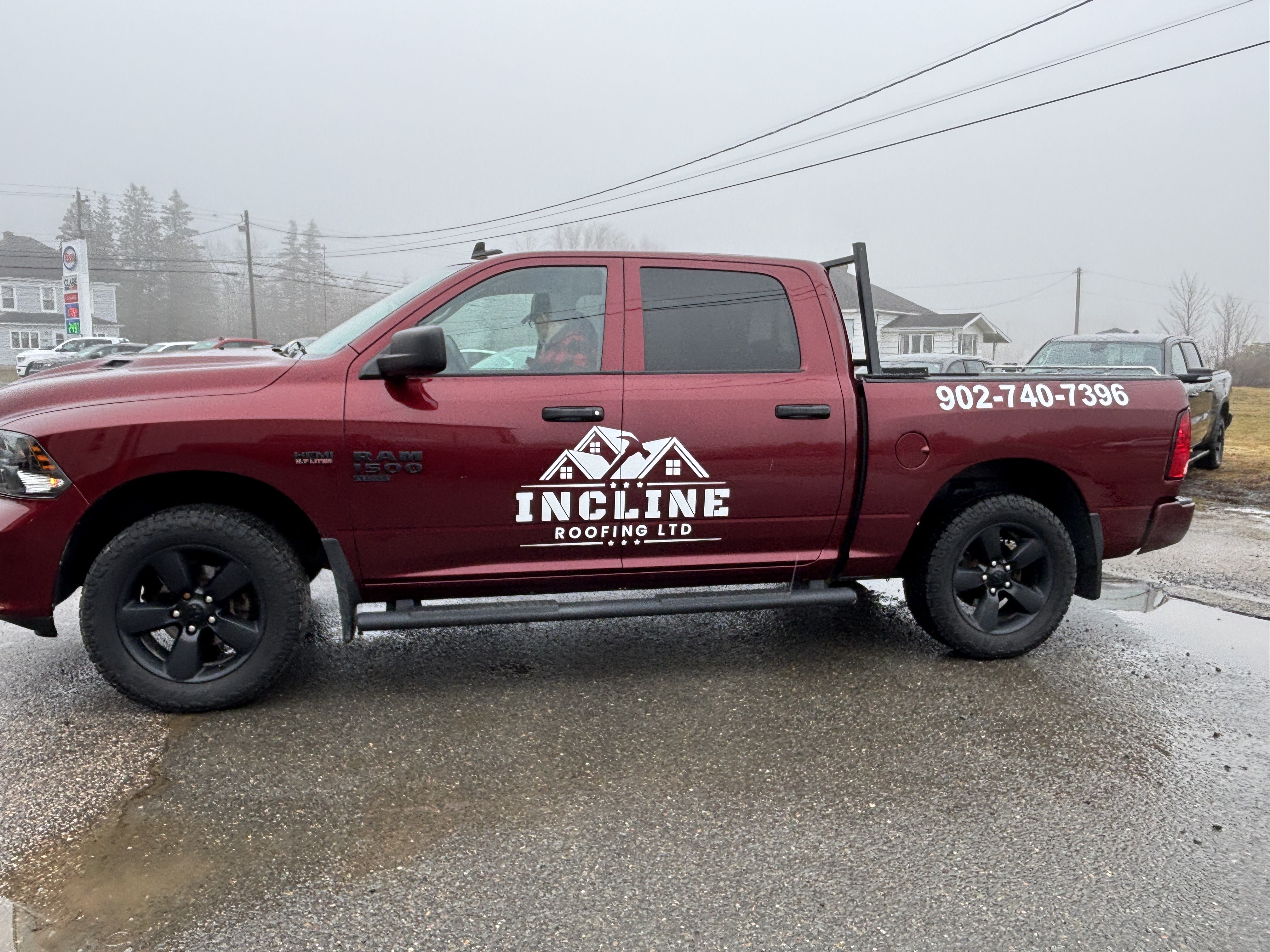 Incline Roofing Ltd Ram truck with logo & phone number