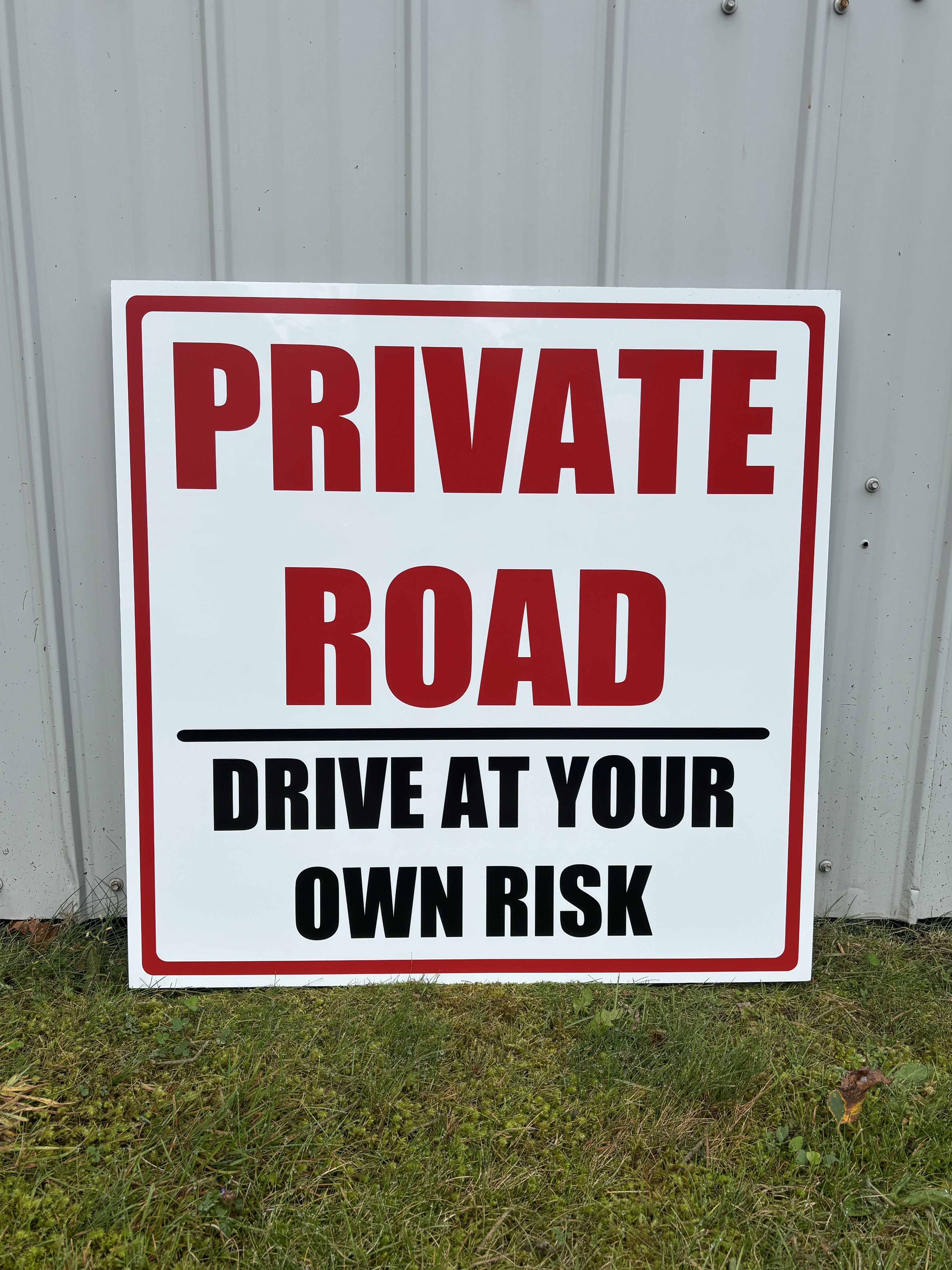Private Road — Drive at Your Own Risk warning sign