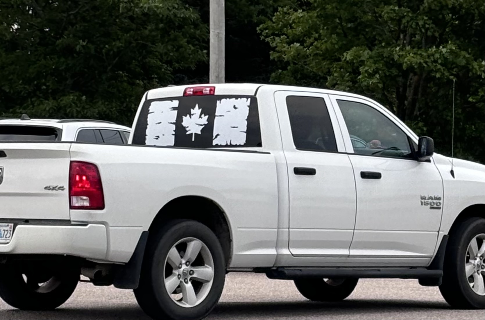 White RAM 1500 Canadian flag rear window decal