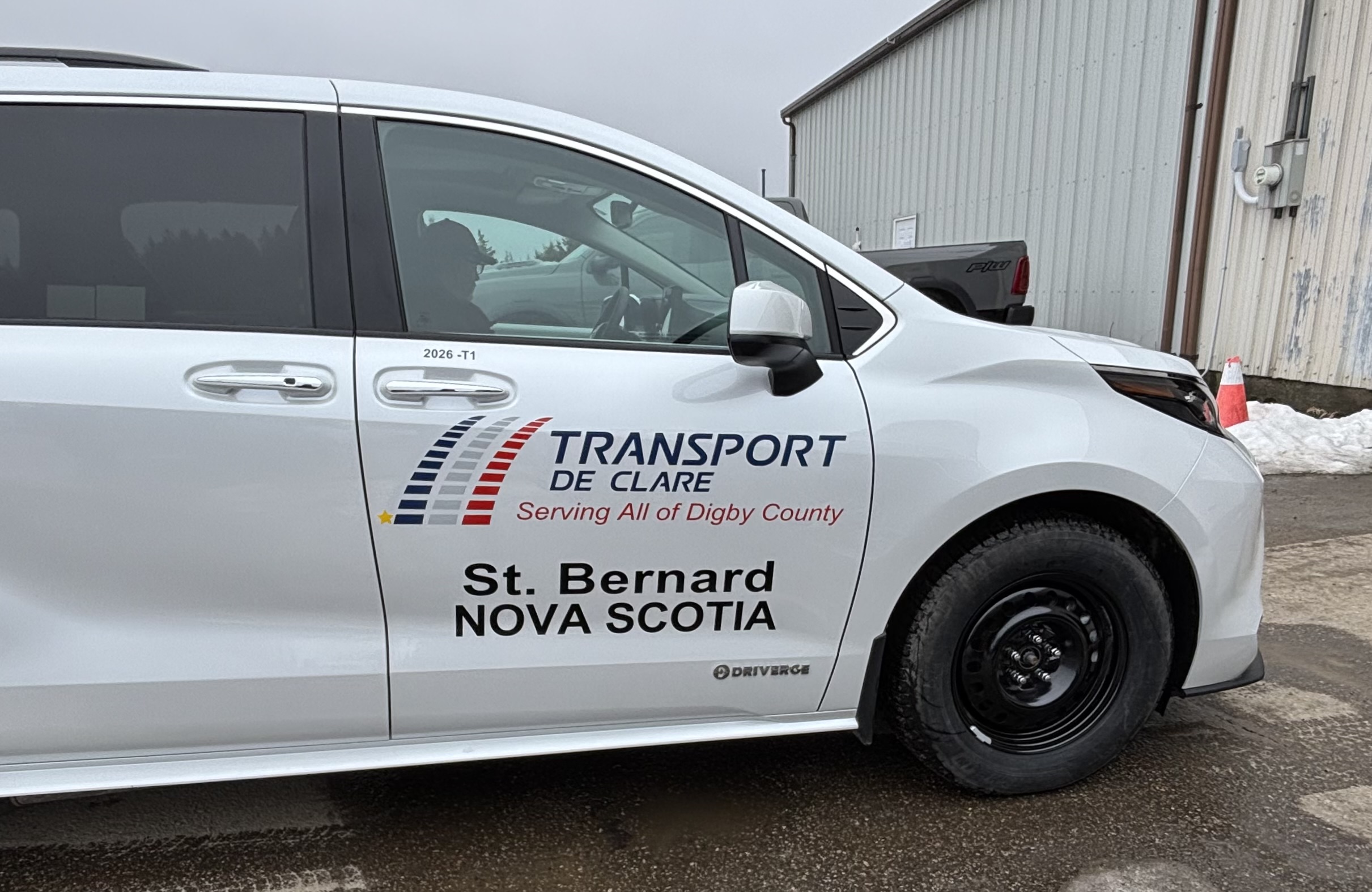 Transport de Clare van with business graphics